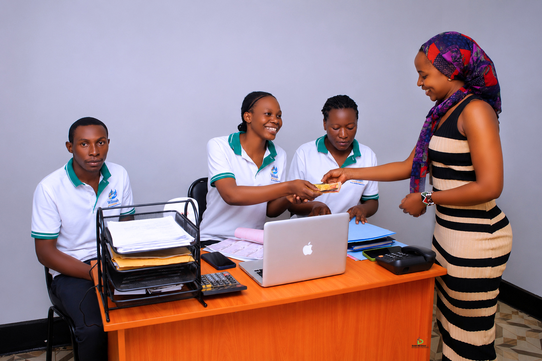 Willmaha staff assisting a client